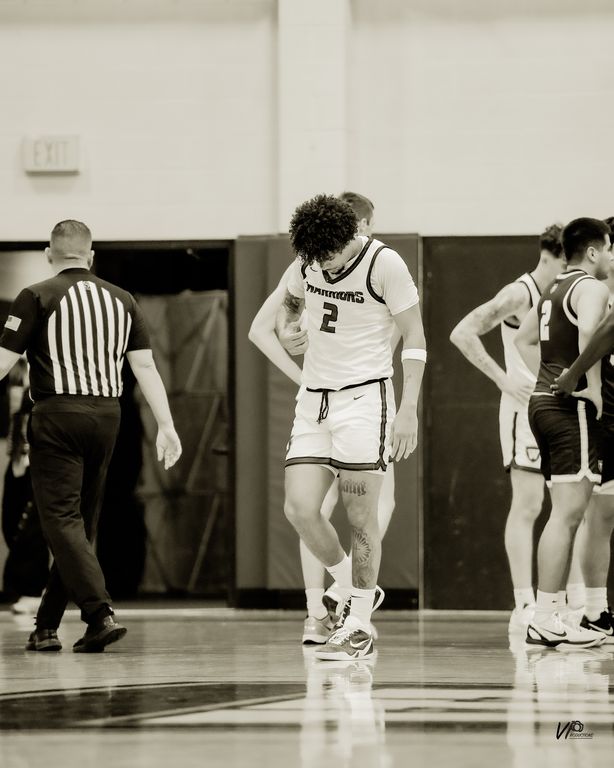 Adrian Mcintyre  Senior Night Westmont — photograph 11